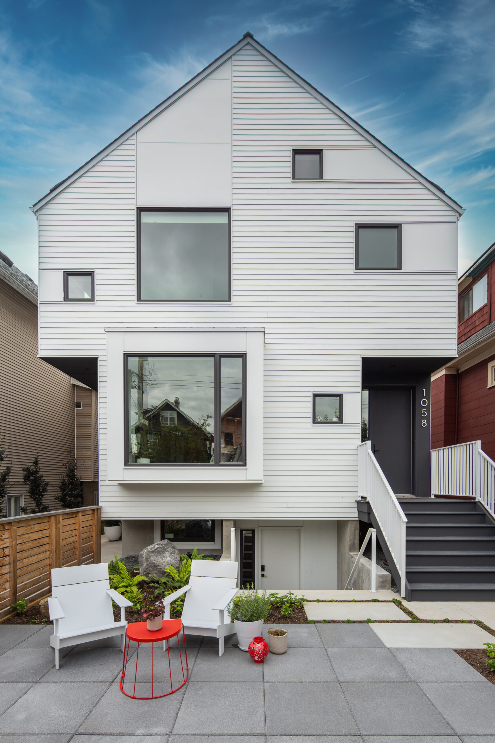 Gable roof white contemporary front back duplex